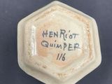 an image of a blue and white cup with writing on it