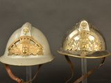 two helmets that are sitting on top of each other