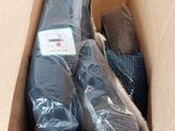 two pairs of socks in a cardboard box on the floor