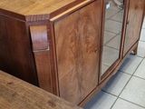 an image of a large wooden cabinet in a store