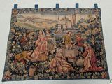 a tapestry hanging on the wall of a room