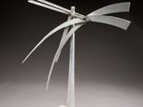 an image of a sculpture made of metal on a white base