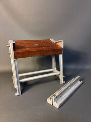 a small table with a wooden top and metal legs