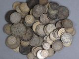 a lot of coins that are on the table