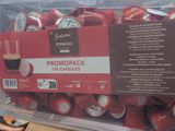 a package of coffee capsules in a plastic container