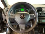 dashboard view of a car with a steering wheel and dashboard controls