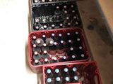 bottles of beer are lined up on a shelf in a store