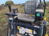 a tractor that is sitting on top of a box