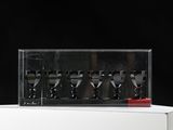 someone is taking a picture of a display case with a bunch of wine glasses in it