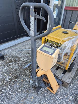 an image of a forklift with a loader on it
