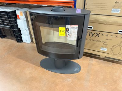 a stove that is sitting on the floor in a store