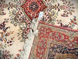 a carpet that has been cleaned and is laying on the floor