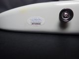 a close up of a surfboard with a sticker on it