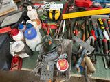 many different tools on the table with a lot of them