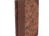 an image of a book with a brown cover and a pattern on it