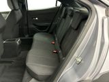 the back seats of a car with a seat belt in the back