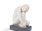 statue of a man sitting on a marble base with his head in his hands