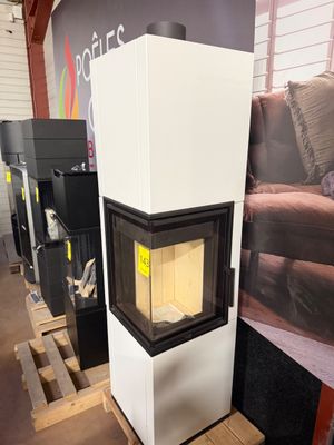 many different types of wood burning stoves in this store