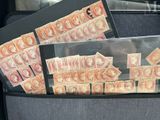 a lot of stamps in the back of a car