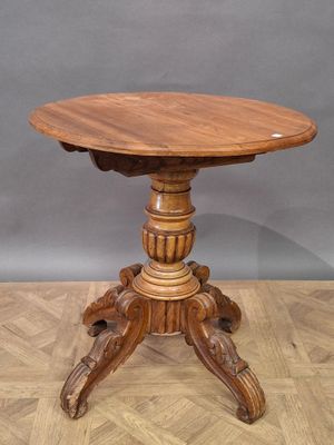 an image of a wooden table on a wooden floor