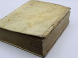 an old book that is sitting on a table