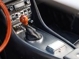 a close up of a car ' s dashboard and steering wheel