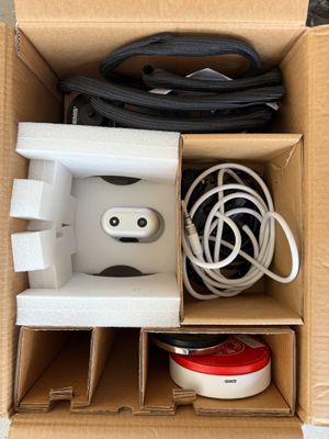a cardboard box with a bunch of wires and wires in it