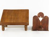 two pieces of wood with a cross on the top and a small wooden table on the bottom