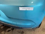 the rear end of a blue car with a sticker on it ' s bumper