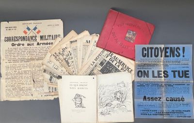a lot of old books and pamphlets on a table