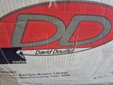a cardboard box with a logo on it sitting on the floor