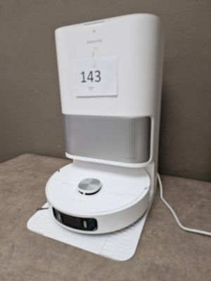 a water dispenser sitting on a counter in a hotel room