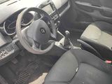 a car that has a steering wheel and a dash board in it