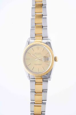 rolex lady ' s watch with two tone gold dial and bracelet