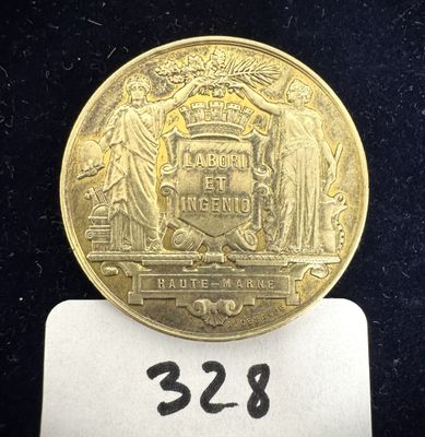 une image d'une pièce d'or sur laquelle figure l'État de New York