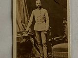 an old photo of a man in a military uniform