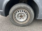 a close up of a flat tire on a car