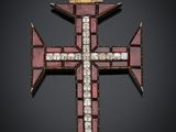 un pendentif en forme de croix rouge et or, orné de diamants, sur fond noir
