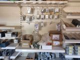 many shelves with various items on them in a store