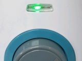 a close up of a blue and white device