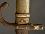 a close up of a metal object with a handle