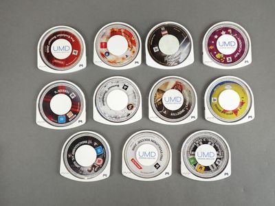 a lot of different types of cds on the table