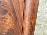 a close up of a wooden door with a handle