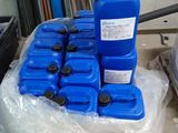 a pile of blue plastic containers sitting on top of a pile of plastic