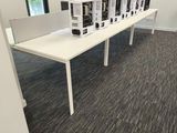 a long table with a bunch of boxes on top of it