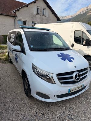 a white van that is parked next to a white van