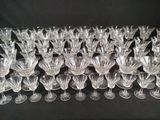 a lot of wine glasses that are sitting on a table