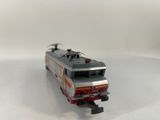 a toy train that is sitting on a white surface