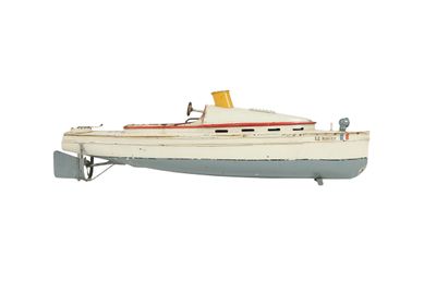 a model of a boat on a stand on a white surface