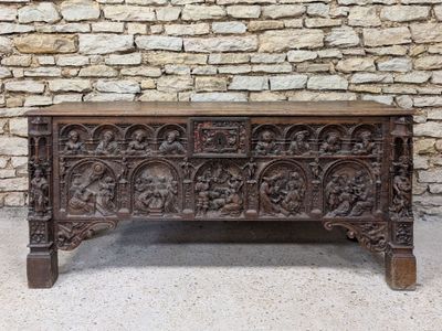 an old wooden chest with carvings and carvings on the sides